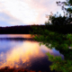 A beautiful view of a sunset over water.