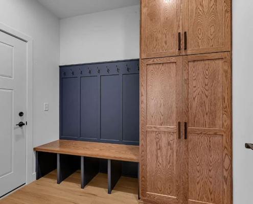 A mud room in a Harren Companies family home featuring built-in storage.