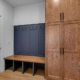 A mud room in a Harren Companies family home featuring built-in storage.