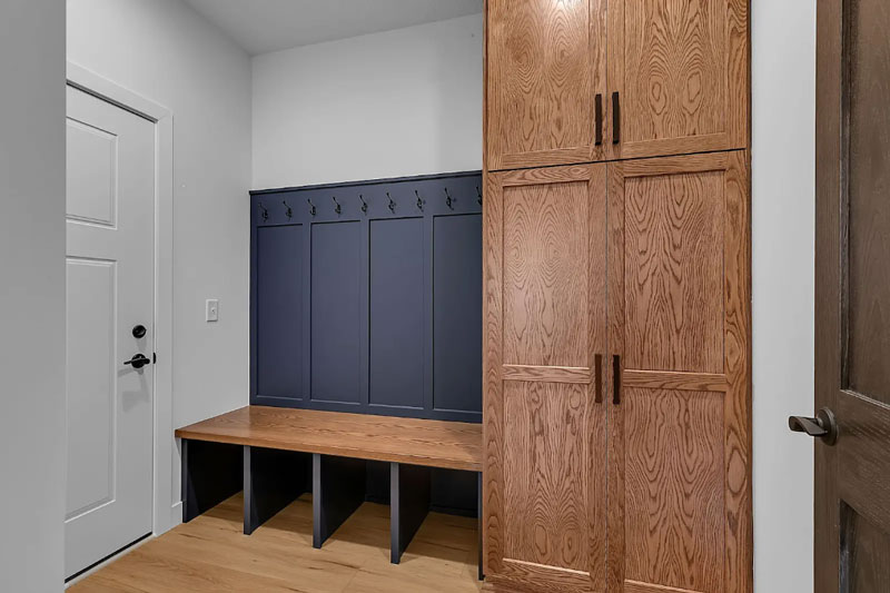 A mud room in a Harren Companies family home featuring built-in storage.