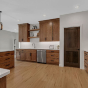 A spacious patio home kitchen with a built-in storage pantry.