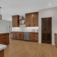 A spacious patio home kitchen with a built-in storage pantry.